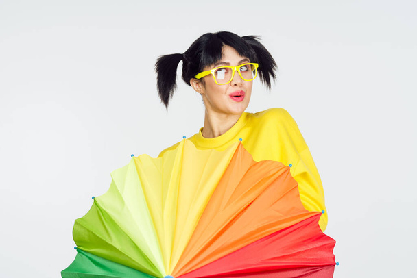 woman with multicolored umbrella fun posing fashion - Foto, Bild