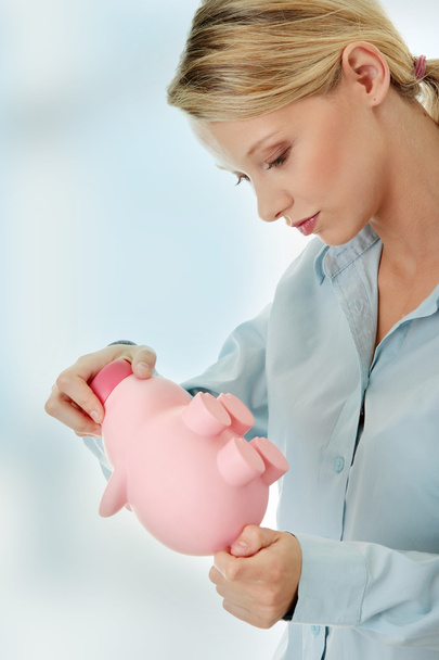 Woman with piggy bank - Photo, Image