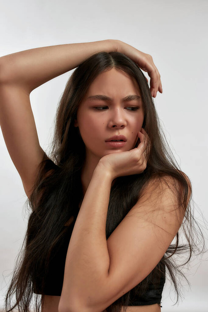 Narrow shot of displeased Asian woman show discontent - Valokuva, kuva