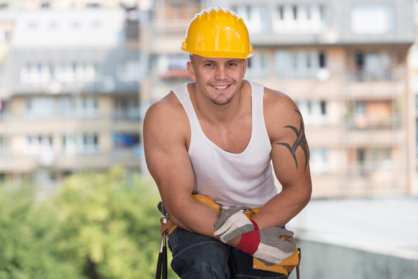 Construction Worker Taking A Break On The Job - Foto, afbeelding