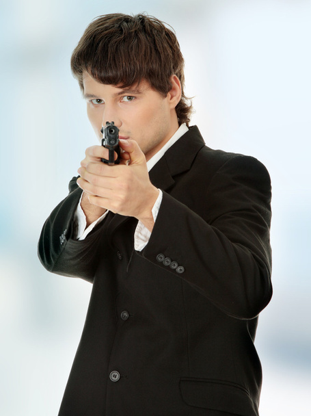 Businessman aiming with handgun - Zdjęcie, obraz