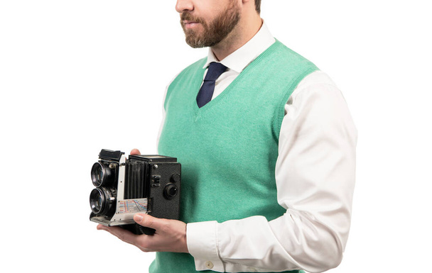 Facet trzymający aparat fotograficzny. amatorskie i profesjonalne zdjęcia. - Zdjęcie, obraz