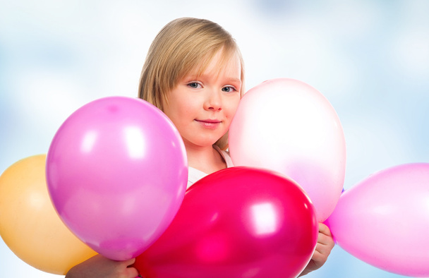Pretty little girl with balloons - Zdjęcie, obraz