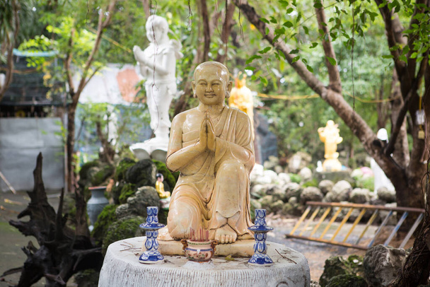 Estátua de Buda usada como amuletos da religião budista. - Foto, Imagem