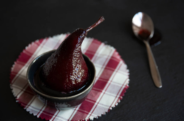 Sweet pear cooked with red wine, delicious homemade dessert - Φωτογραφία, εικόνα