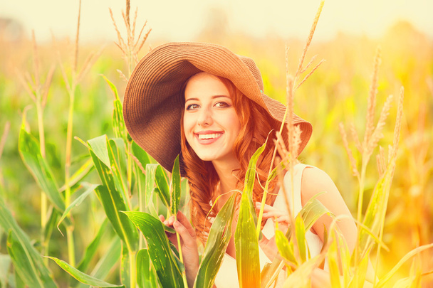 Redhead girl in corn field - Fotoğraf, Görsel