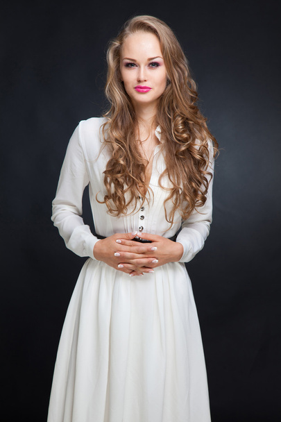 Smiling girl in white dress - Photo, Image