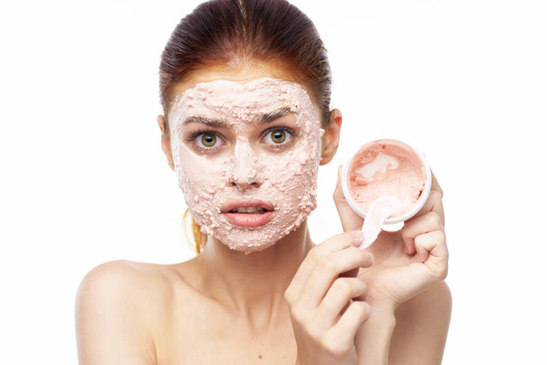 woman with face mask bare shoulders clear skin rejuvenation beauty - Foto, afbeelding