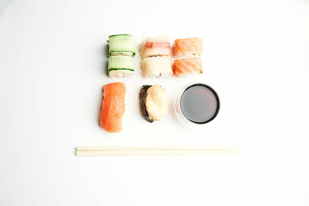 sushi chopsticks soy sauce snack delicacy japanese cuisine - Фото, зображення