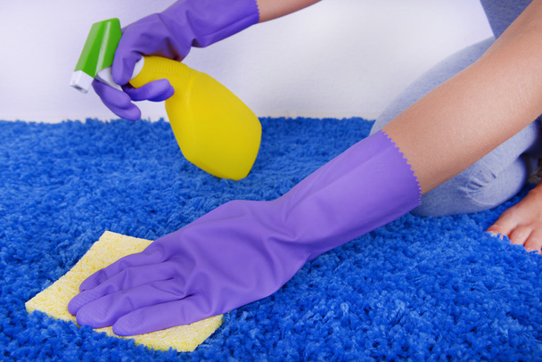 Cleaning carpet with cloth and  sprayer close up - Photo, Image