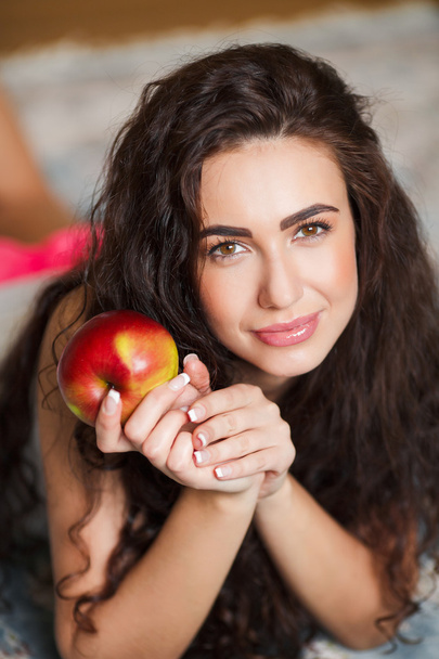 Very nice model of ethnic, there is a Red Apple - Foto, Imagen