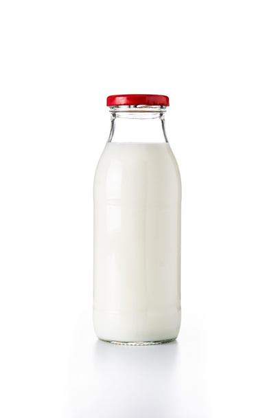Milk bottle isolated on white background - Фото, изображение