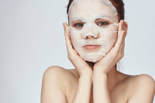 pretty woman naked shoulders face mask close-up skin care - Zdjęcie, obraz