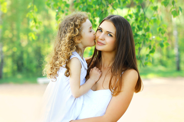 Lovely mother and daughter, happy family - Photo, image