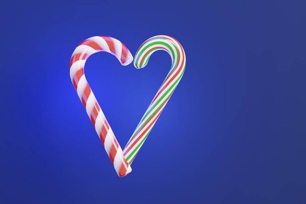 Tradicional aislado dulce bastón de caramelo Navidad año nuevo dulces tratar, marco plano en el fondo azul tendencia, espacio de copia gratuita para el texto - Foto, Imagen