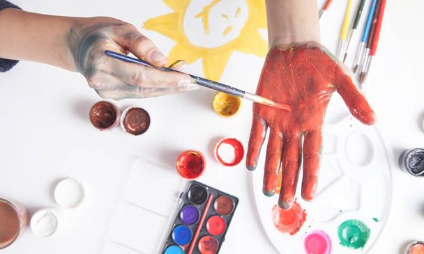 Painter holding brush and paint. Hobby - Photo, Image