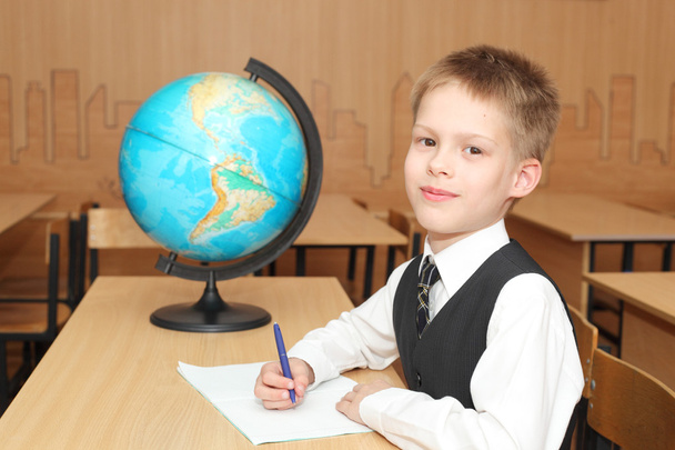 Little boy in a classroom - Фото, зображення