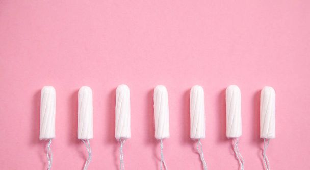 Menstrual tampon on a pink background. - Photo, Image