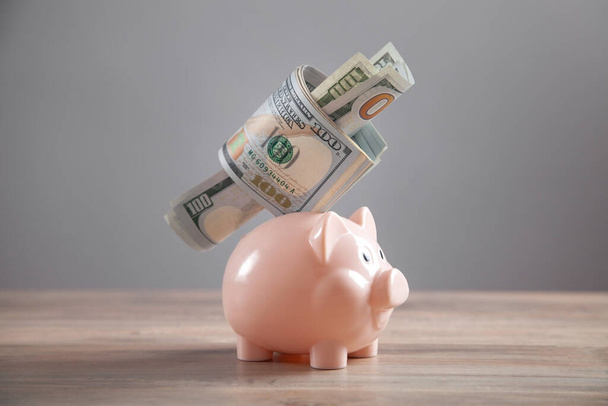 Piggy bank and money on the desk. Saving. Business - Foto, imagen