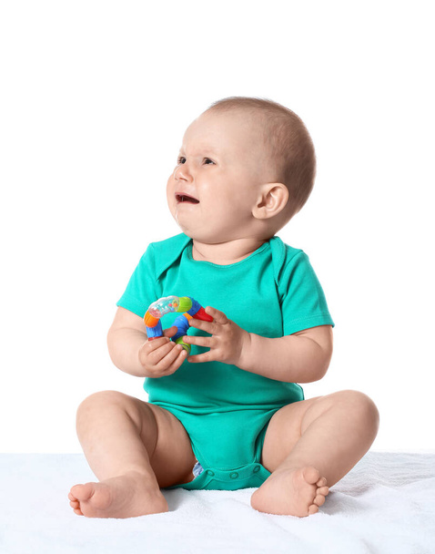 動揺小さな赤ちゃん男の子遊びとともにおもちゃ上の白い背景 - 写真・画像
