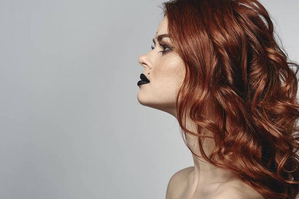 red-haired woman with bare shoulders bright makeup base zodiac sign horoscope - 写真・画像