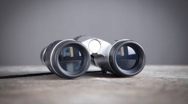 Binoculars on the table. Hiking accessory - Foto, Imagem