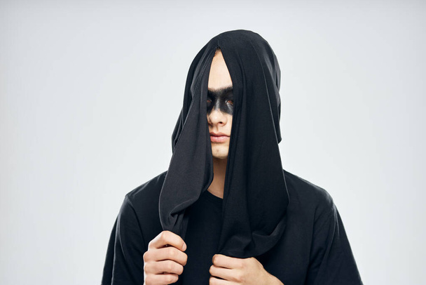 man in black mask halloween horror ghost dark background - Фото, зображення