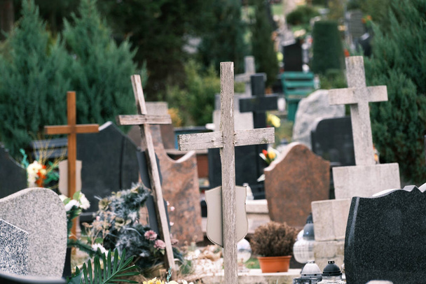 wooden crosses on a cemetery in Poland - 写真・画像