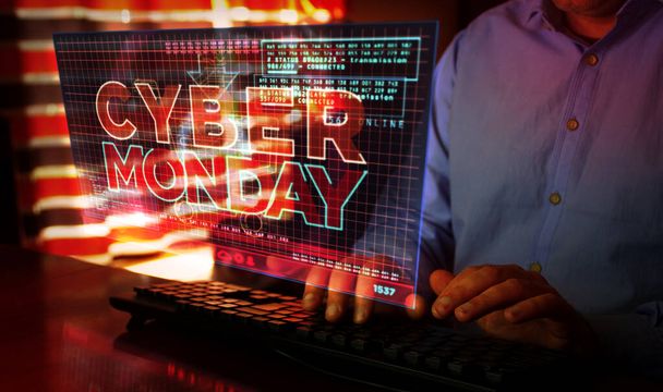 Cyber Monday on computer screen. Hot deal, shopping, big sale and special offer abstract concept 3d with glitch effect. Man typing keyboard. - Photo, Image