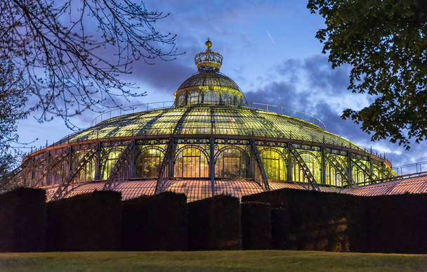 Laeken, Brussels Capital Region - Belgium - 04 28 2018: The Royal glasshousess and garden during sunset - 写真・画像