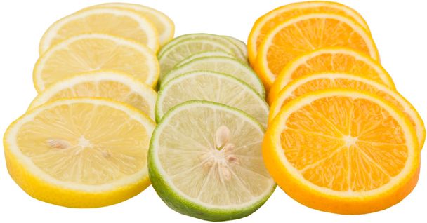 Lime, lemon and orange layer slices over white background - Foto, immagini