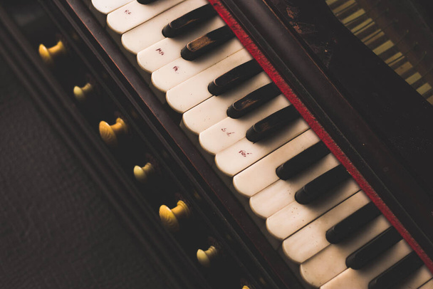 Harmonium keys with vintage looks  stock image, selective focus. - Φωτογραφία, εικόνα