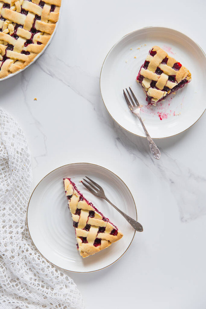 Slice of homemade cherry pie with on white background. - Φωτογραφία, εικόνα