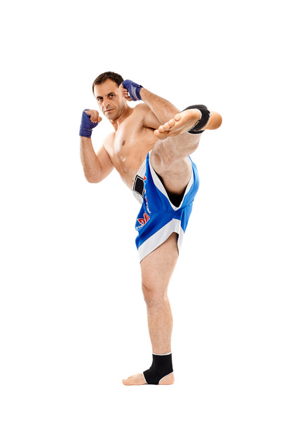 Kickbox fighter executing a kick - Foto, Imagem