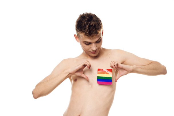 guy with a topless lgbt community transgender light background - Photo, Image