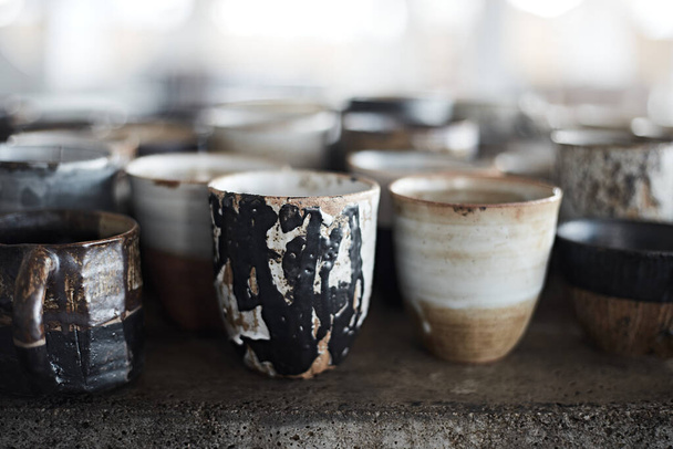 ceramic coffee cup  on blur backgroun - Fotó, kép