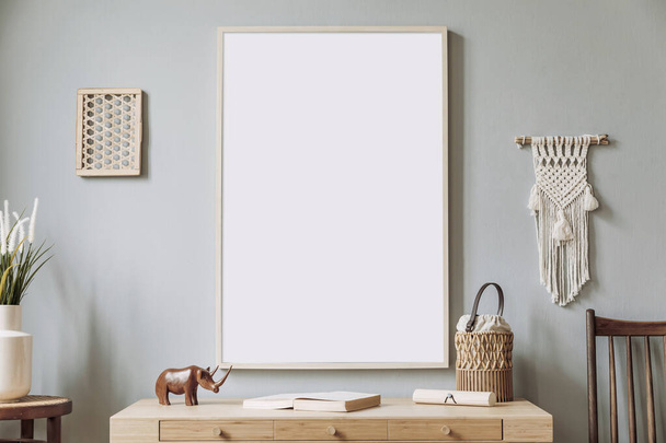 Boho style living room with framed dreamcatcher poster , wooden desk and macrame. Template. Mock up. - Foto, imagen