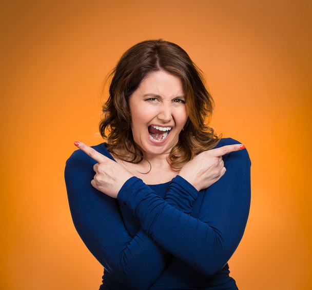 woman pointing in two different directions, stressed, frustrated - Foto, imagen