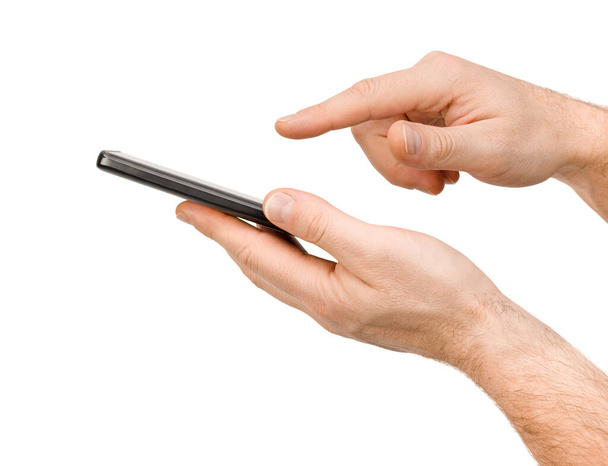 manos masculinas haga clic en la pantalla del teléfono inteligente con el dedo índice aislado sobre fondo blanco - Foto, imagen