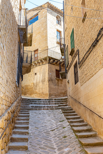 A vertical shot of an old historical stone village street in Calaceite, Teruel, Aragon, Spain - Valokuva, kuva