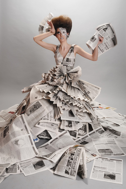Girl in the newspaper - Photo, image