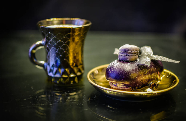 Cup of coffee in a festive atmosphere - Фото, зображення