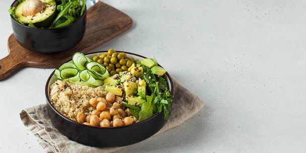 Banner healthy vegetable lunch from the Buddha bowl with quinoa, avocado, chickpeas. Copy space. - Fotografie, Obrázek