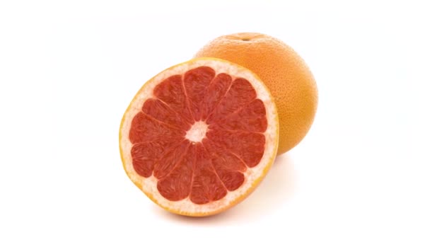 グレープフルーツは単離される。白い背景に黄色のレモン。柑橘類。隔離 - 映像、動画