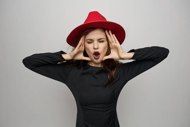 witch in red hat with red lipstick fear holiday - Photo, image