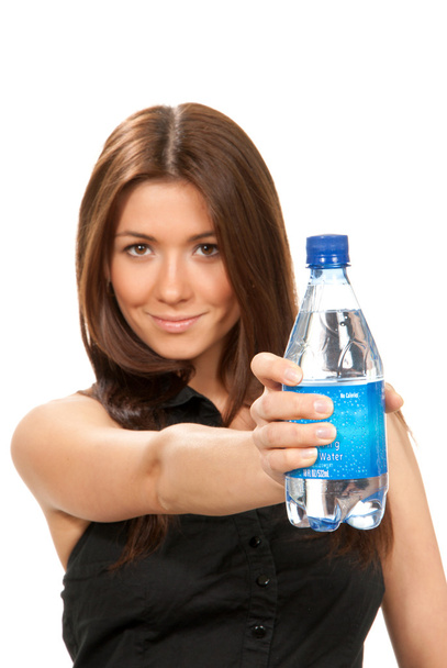 Girl hold bottle of pure drinking water - Foto, Imagen
