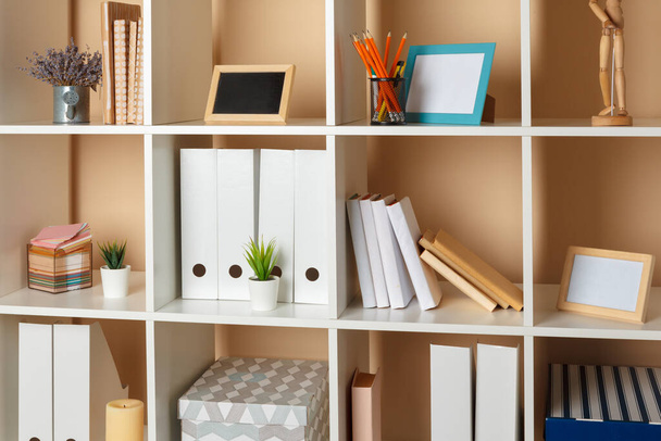 Home office working space. white shelf with accessories - Φωτογραφία, εικόνα