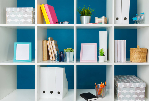 Home office working space. white shelf with accessories - Foto, Imagem