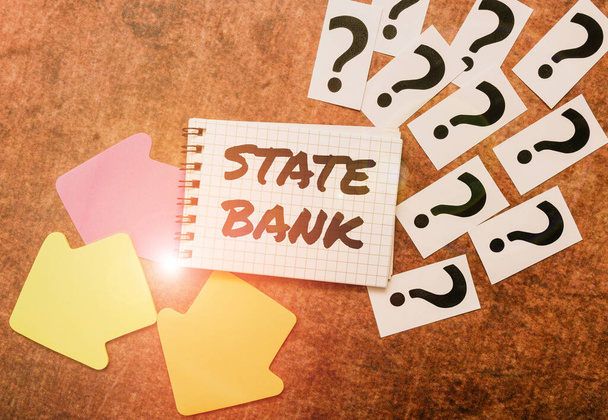 Handwriting text State Bank. Business overview generally a financial institution that is chartered by a state. Writing Inquiries And Thinking Of New Ideas, Breaking Confusion And Mystery - Photo, Image