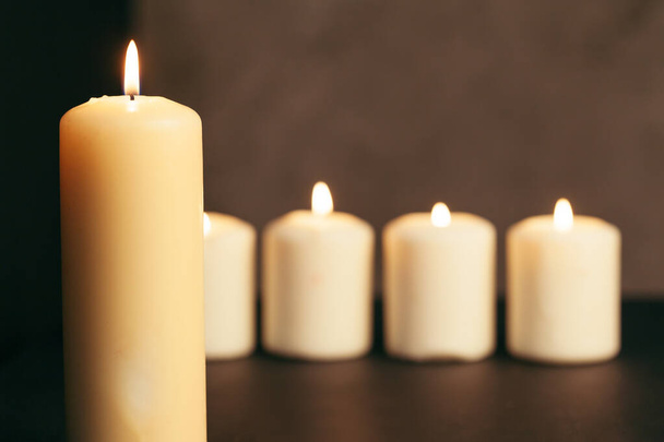 Candle flame close up on a black background - Fotó, kép